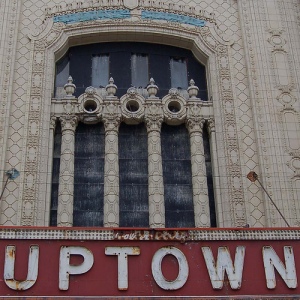 A close-up of the Uptown Theatre's terra cotta-clad grand entrance.   Photo courtesy of flickr user Anne Rossley.